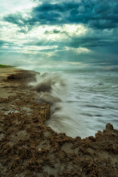 Waves crashing on rocks during storm