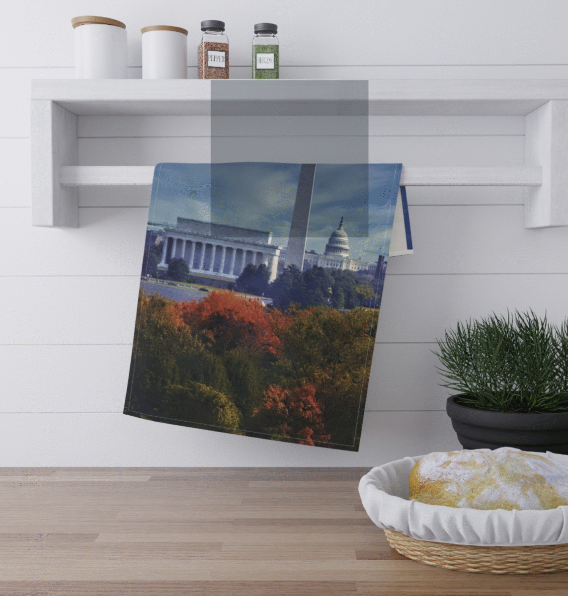 Washington D.C. skyline featuring the Washington Monument, Lincoln Memorial, and the U.S. Capitol Building, with colorful autumn foliage in the foreground.