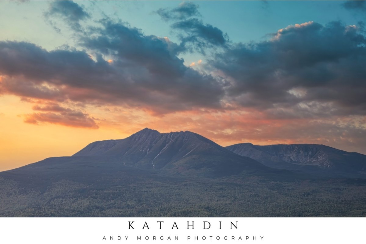 Poster showing the silhouette of Mount Katahdin in Baxter State Park, Maine, against a dramatic sunset sky with orange and blue clouds.