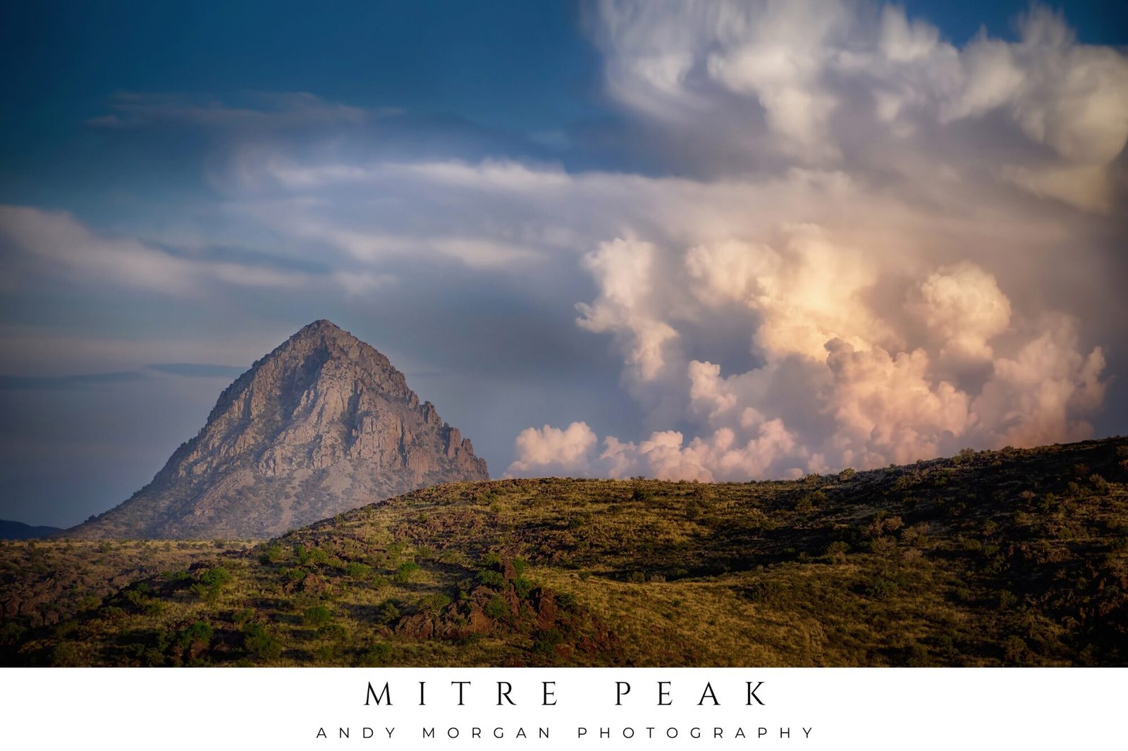 Poster showing Mitre Peak, a conical mountain in the Davis Mountains of West Texas, under a dramatic sky with large, illuminated clouds.