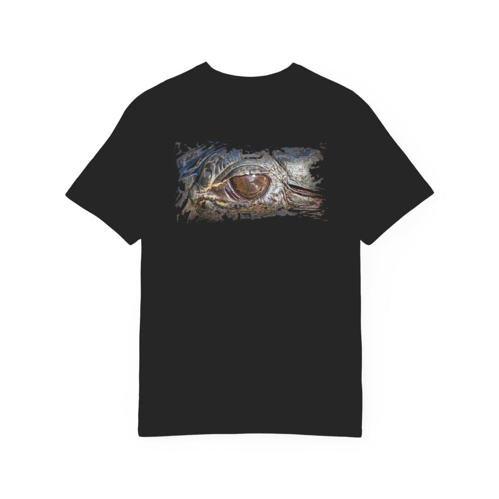 Close-up of a striking 'Eye of the Gator' graphic printed on the back of a black unisex t-shirt