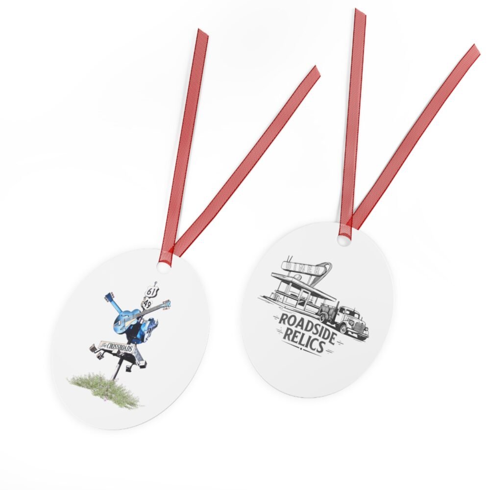 Oval metal ornament with red ribbon, featuring a blues crossroads sign with a blue guitar on one side and a "Roadside Relics" diner and truck design on the other.
