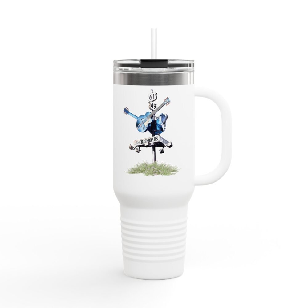 White travel tumbler with a clear lid and straw, featuring a blues crossroads sign with a blue guitar and "THE CROSSROADS" text.