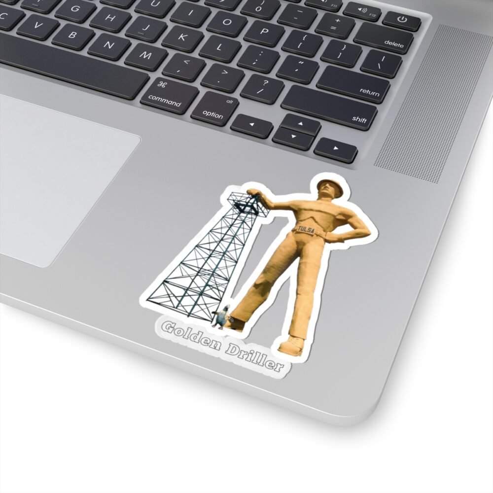 A die-cut vinyl sticker featuring the "Golden Driller," a large oil worker statue, standing next to an oil derrick, with text that reads "Golden Driller TULSA, OKLAHOMA."