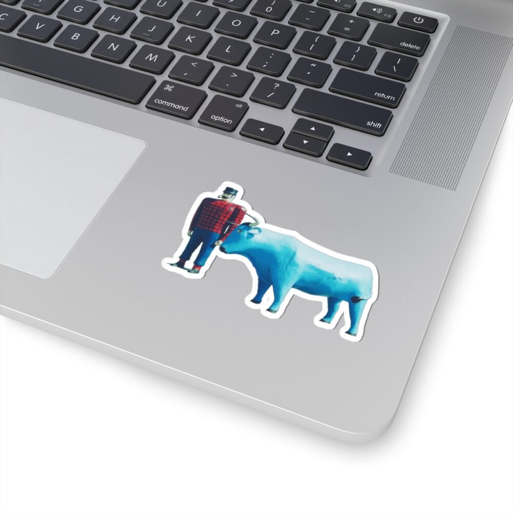 Laptop with a die-cut sticker of Paul Bunyan and Babe the Blue Ox.