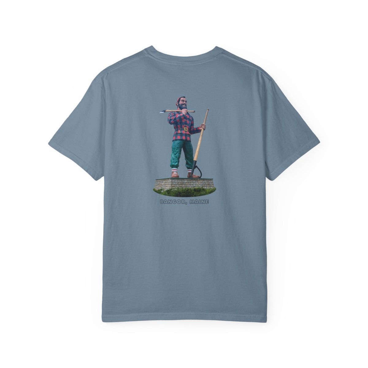 A blue-grey t-shirt with a graphic of a large statue of Paul Bunyan holding an axe and a peavey, with text that reads "BANGOR, MAINE."