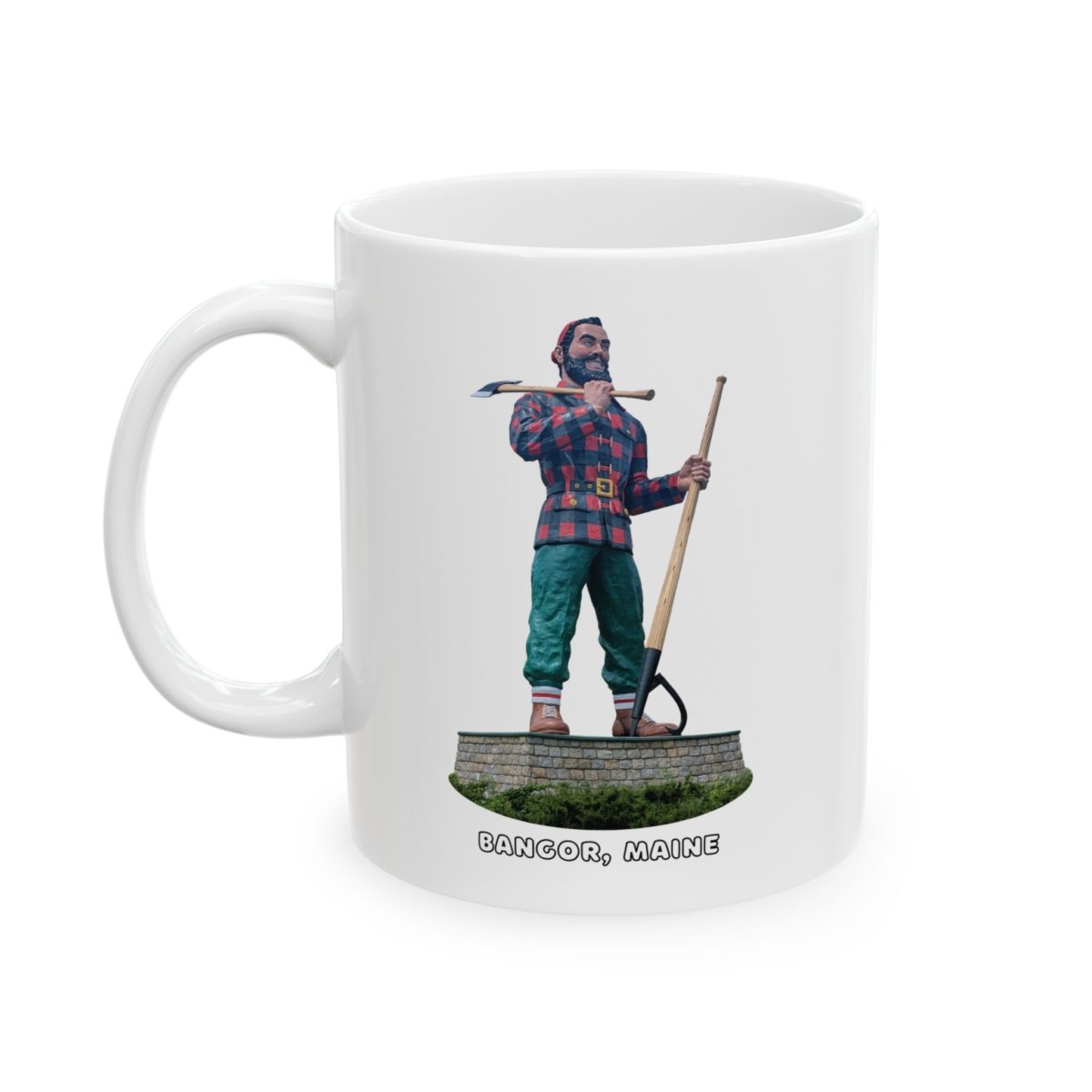 A white ceramic coffee mug with a graphic of the Paul Bunyan statue from Bangor, Maine, holding an axe and peavey, with "BANGOR, MAINE" text below.
