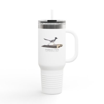 White travel tumbler with a clear lid and straw, featuring an illustration of Paisano Pete the Roadrunner from Fort Stockton, Texas.