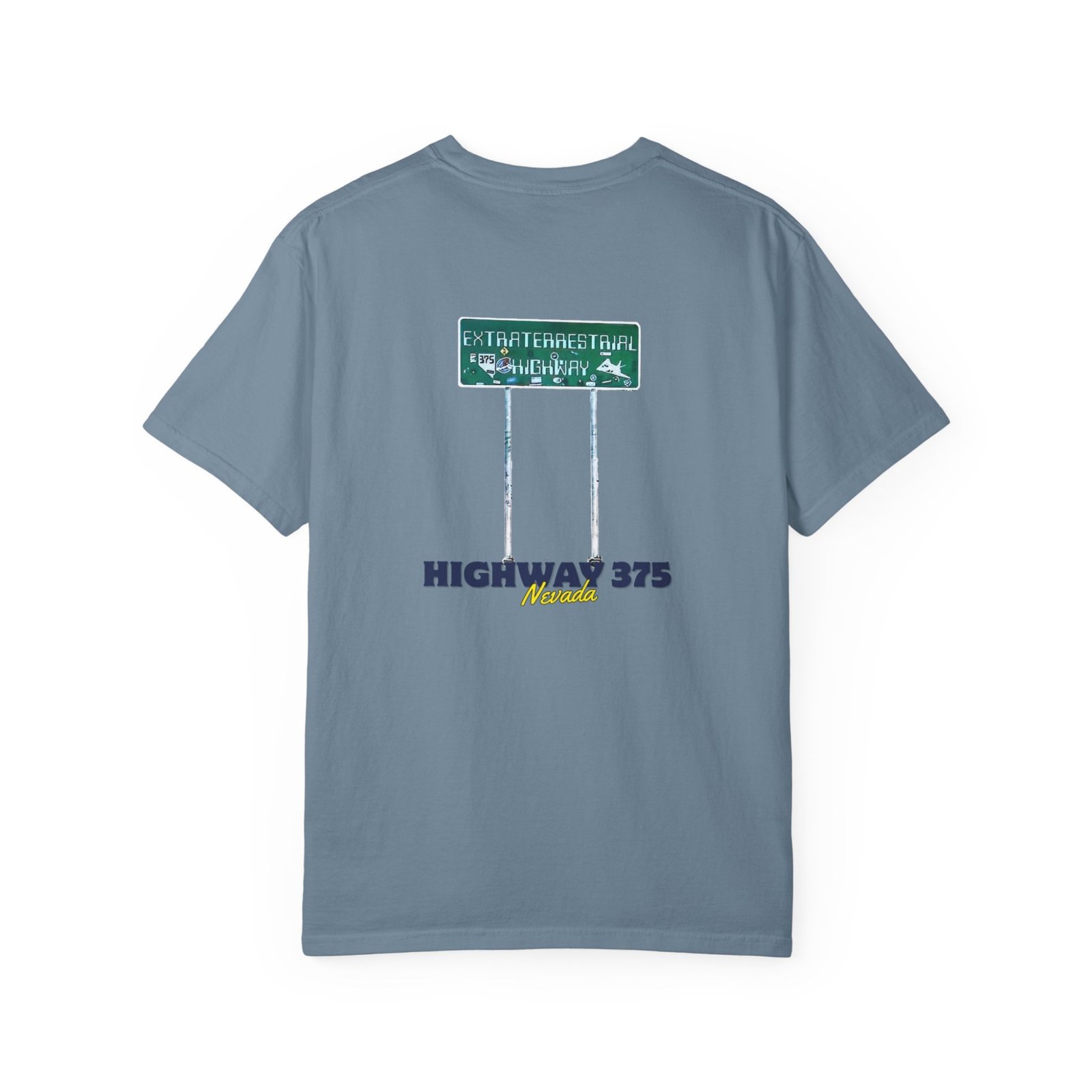 A light blue t-shirt with a graphic on the back featuring the Extraterrestrial Highway road sign and the text "HIGHWAY 375 Nevada."